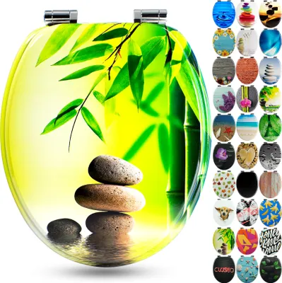 A collage of toilet seat covers with various designs, featuring a large main image of a toilet seat with a bamboo and stone zen design.