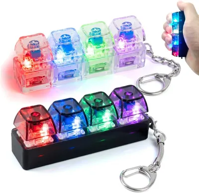 Imagen del producto de Juguete antiestrés con forma de teclado: set de 2. Mini teclado con 4 teclas que se iluminan. Llavero con forma de teclado