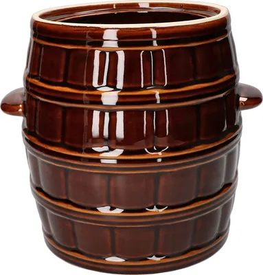 A brown ceramic pot with handles, shaped like a barrel.