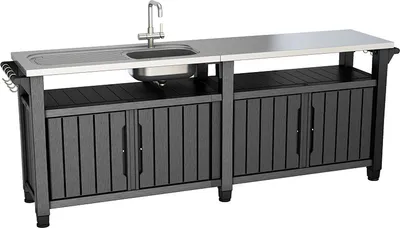 An outdoor kitchen unit with a sink and storage cabinets.