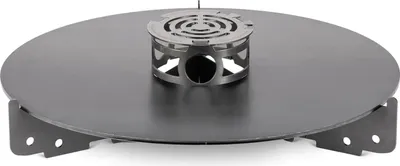 A black metal grill plate with a central burner assembly, shown from a slightly elevated diagonal angle against a white background.