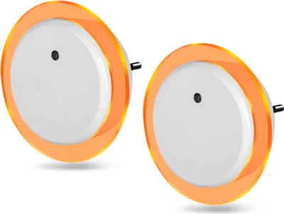 Two round LED night lights with orange trim are shown against a white background.