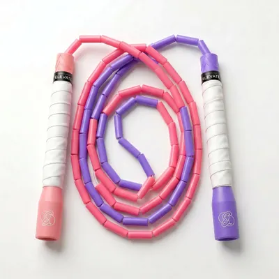 Obrázok produktu pre Skákacie lano s korálkami, ružové a fialové