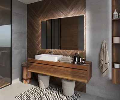 A modern bathroom with a wooden vanity, a rectangular sink, and a large illuminated mirror.