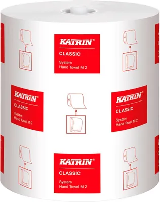 A roll of Katrin Classic System Hand Towel M2 paper towels, with multiple labels showing product information and diagrams.
