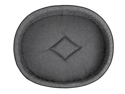 A top-down view of an oval-shaped dog bed.