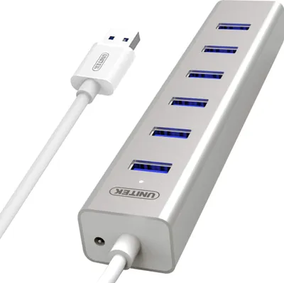 A silver USB hub with a white USB cable is shown against a white background.