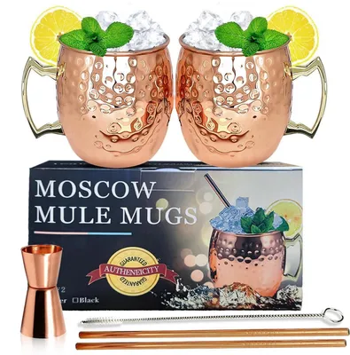 Image de Ensemble de deux verres "Moscow Mule" de 18oz, en cuivre martelé, avec pailles, doseur et ouvre-bouteille