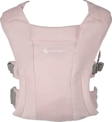A pink baby carrier is shown against a white background.