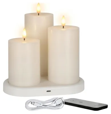 Produktbild von LED Echtwachs Kerze 3er Set wiederaufladbar mit Ladestation und Fernbedienung - 15 / 12 / 10 cm - Künstliche Stumpenkerze mit Flammen Effekt