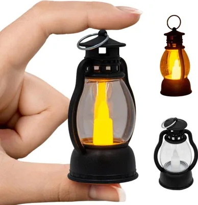 Immagine prodotto di Mini lanterna LED 9 cm - Lanterna decorativa con luce intermittente - Lanterna da tavolo con luce LED - Funzionamento a batteria - Aspetto lampada a olio nera - Portatile e sicura - Luce d'atmosfera per la casa e il giardino