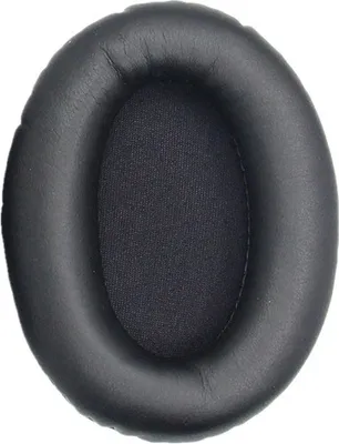A close-up of a black headphone earpad.