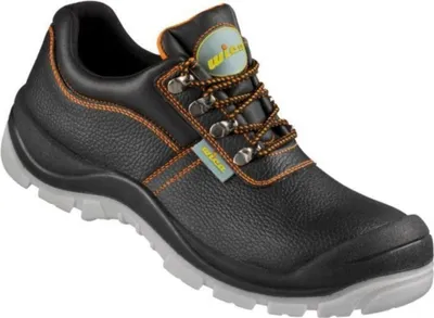 A studio shot of a black safety shoe with orange stitching and laces.