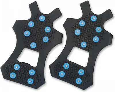 A pair of black ice cleats with blue metal studs, shown from a top-down diagonal view against a white background.