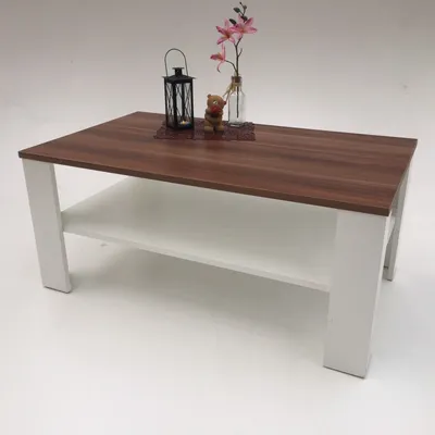 A coffee table with a brown top and white legs, displayed on a white background.
