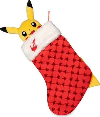A Pikachu plush toy peeking out of a red Christmas stocking.