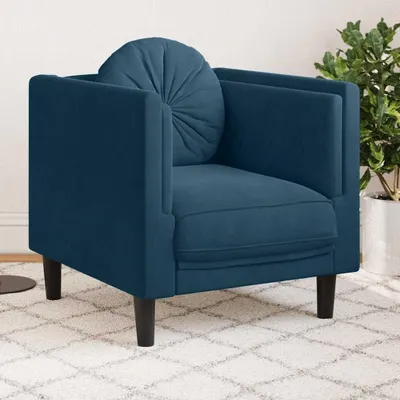 Produktbild von Blauer Samtsessel mit Kissen für komfortable Entspannung im Wohnzimmer