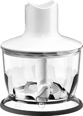 A white and clear blender attachment with blades inside.