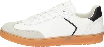 A side view of a white sneaker with a gum sole.