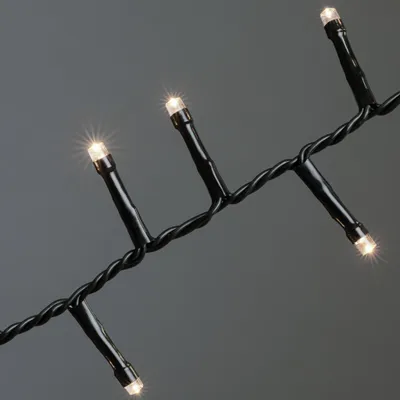 Produktbild von Konstsmide Micro LED Compactlights, 2000 warm weiße Dioden, 30V, Außen (IP44), schwarzes Kabel - 3872-100