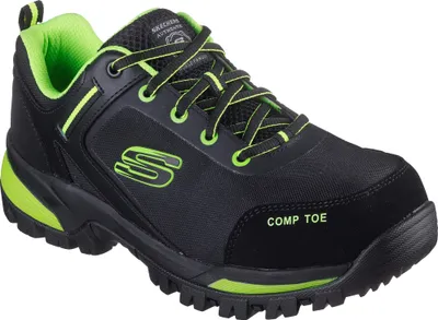 A single black and lime green work shoe is shown from a side angle against a white background.