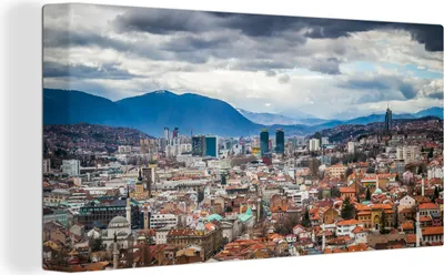 Produktbild von MuchoWow® - Leinwandbilder - Wolkendecke über Sarajevo Bosnien und Herzegowina, Wandbild, Wanddeko Bilder Wohnzimmer, 40x20 cm