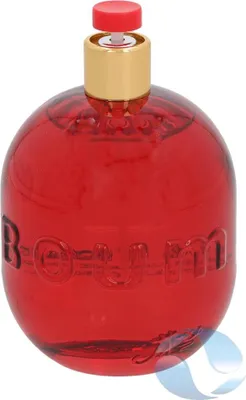 A red, spherical perfume bottle with a gold cap and red spray nozzle.