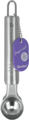 A close-up studio shot of a metal ice cream scoop with a purple tag attached.