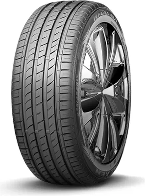 A close-up studio shot of a car tire mounted on a shiny chrome rim, presented against a white background.