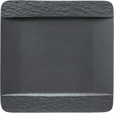 A square plate with a textured rim on the top and bottom edges, set against a plain gray background.
