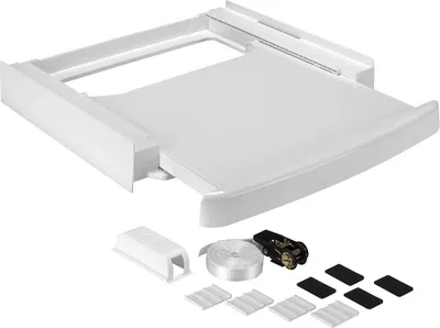 A white washing machine stacking kit and accessories are displayed against a white background.