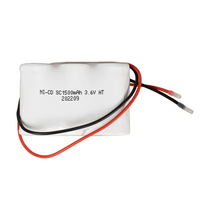 A white battery pack with red and black wires against a white background.