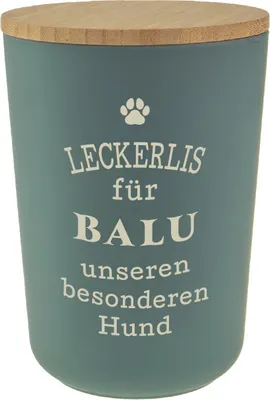 A teal colored storage tin with a wooden lid, featuring text and a paw print graphic.