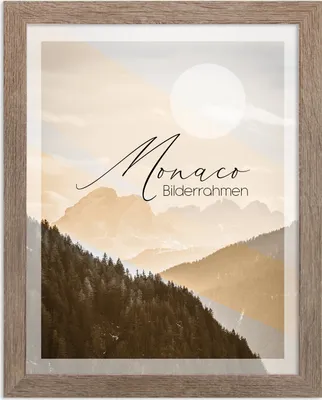 A framed picture of a mountain landscape with text overlay.
