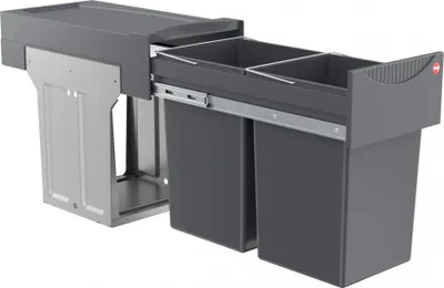 A pull-out kitchen waste bin system with two compartments.