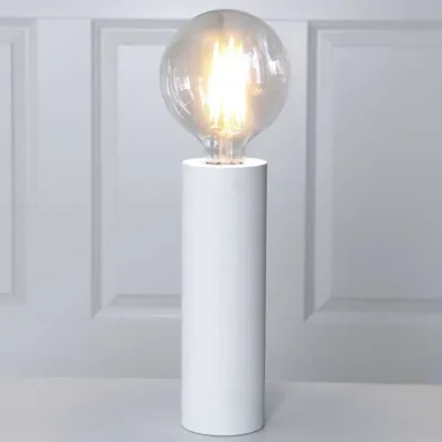 A white cylindrical lamp base with a clear, glowing light bulb on top, set against a white paneled background.