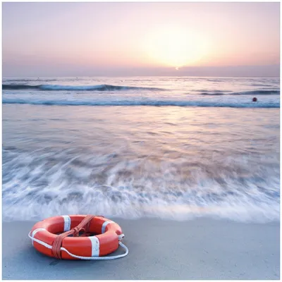 Produktbild von Wallario Memoboard Magnettafel aus Glas, Größe 50 x 50 cm, Motiv Rettungsring am Strand bei Sonnenuntergang