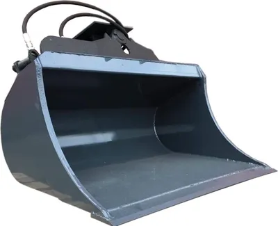 A heavy-duty excavator bucket, also known as a digger bucket, is shown against a white background. The bucket is made of dark gray metal and appears to be a universal attachment for hydraulic excavators.