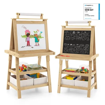 Two wooden easels for children, one with a whiteboard and drawing, the other with a chalkboard and drawings, both with storage shelves below.