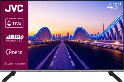 A JVC 43-inch Smart TV with a cityscape and bridge image displayed on its screen, set against a white background with a purple overlay on the left side detailing product features.