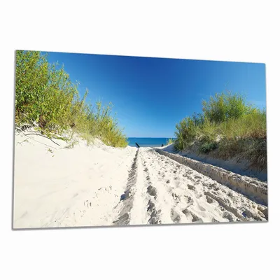 Produktbild von Wallario Herdabdeckplatte aus Glas, Größe 90 x 52 cm 1-teilig, Motiv Auf dem Sandweg zum Strand - Blauer Himmel über dem Meer