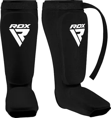 Produktbild von RDX Schienbeinschoner Kickboxen, Schienbeinschützer Thaiboxen Kampfsport Muay Thai MMA Spannschützer, Schienbeinschutz Polster Shin Guard Sparring, Herren Damen Fußschutz Kick Boxing Ausrüstung