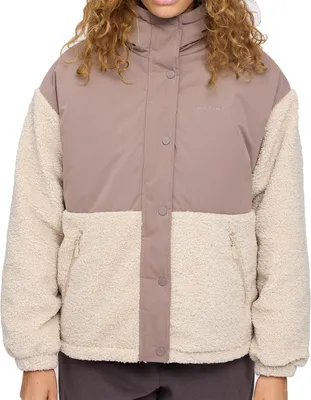 A woman wearing a jacket.