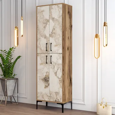 A tall cabinet with a marble-patterned front and wood-grain sides, standing on black legs. It is placed in a room with decorative wall molding and modern pendant lights.
