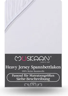 A white fitted sheet with a branded label.