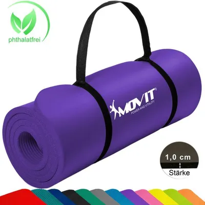 A rolled-up purple yoga mat with a black carrying strap and a logo. Several other colored mats are visible at the bottom.