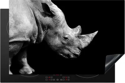 Produktbild von KitchenYeah© Herdabdeckplatte Portrait Nashorn auf schwarzem Hintergrund , 81x52cm, Küche Deko, Glaskeramikkochfeld Herdabdeckung, Abdeckplatte fùr Kochfeld