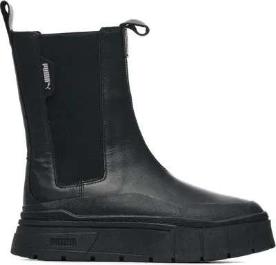 A black Puma Chelsea boot with a thick platform sole, shown from the side against a white background.