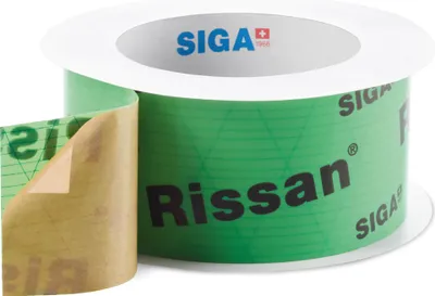 A roll of green tape with black text and a white spool.