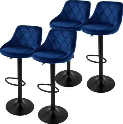 Four blue velvet bar stools with black bases and stems are arranged on a white background.
